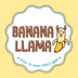 A square graphic label or sticker design with a scalloped white border on a pale yellow background. The central text reads 'BANANA LLAMA' in brown lettering, with a cartoon llama peeking out from a peeled banana.